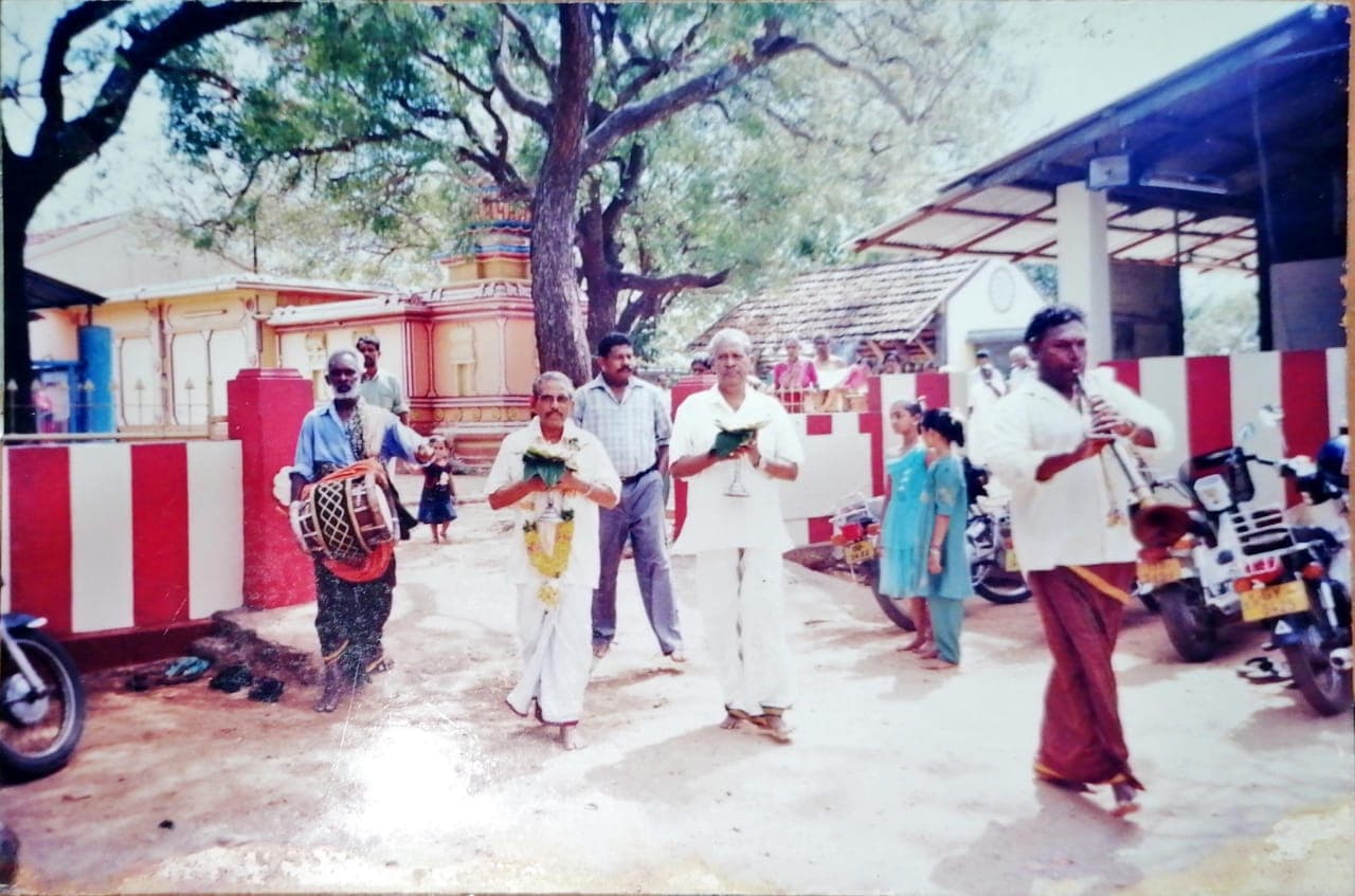 A procession in the temple grounds, led by nadaswaram and thavil